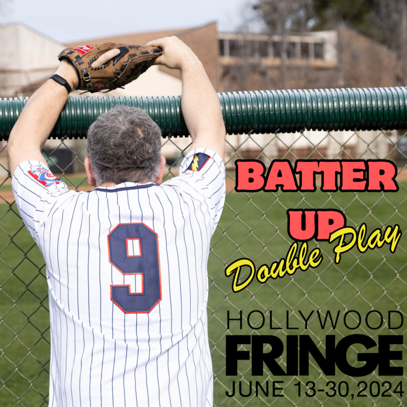 A man wearing a white pinstriped baseball jersey with the number 9 on the back leans against a chain-link fence, watching a baseball field. He holds a brown baseball glove in one hand, resting it on the top of the fence. The background includes a baseball field and a few buildings. Overlaying the image is the text 'BATTER UP' in bold red letters, 'Double Play' in yellow cursive script, and 'HOLLYWOOD FRINGE' in black text, with the event dates 'JUNE 13-30, 2024' below.